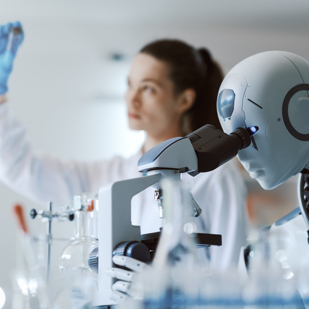 Female scientist and AI robot working together in the science lab. Artificial Intelligence in Healthcare.