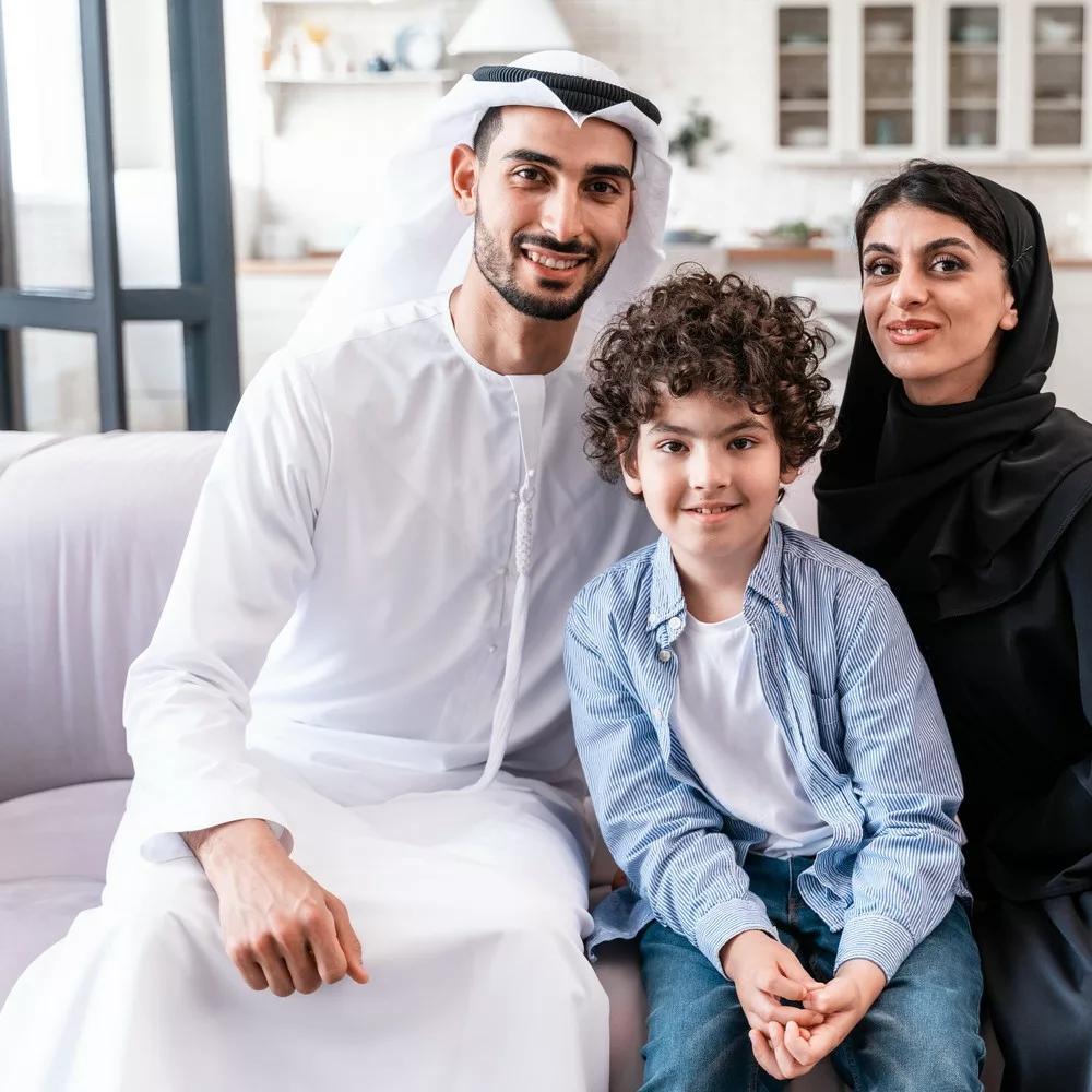 Happy family spending time together. Arabian parents and kid lifestyle moments at home. Happy and healthy Eid.
